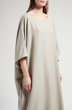 Slouchy dolman sleeves and a softly scooped neckline play up the oversized cocoon shape of this insouciant midi dress made from soft cashmere. 48" length (size Medium) Slips on over head Scoop neck Elbow-length sleeves Side-seam pockets 100% cashmere Dry clean Made in Italy Designer Clothing Oversized Chic Beige Midi Dress, Chic Beige Loose Fit Midi Dress, Elegant Oversized Short Sleeve Midi Dress, Cocoon Dress, Scooped Neckline, Elbow Length Sleeve, Nordstrom Dresses, Dolman Sleeve, Dress Making