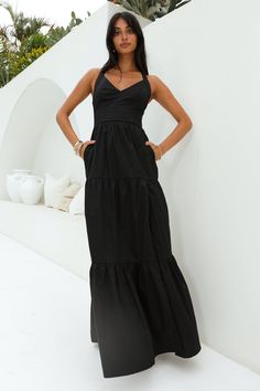 Length from shoulder to hem of size S: 146cm. 
 Chest: 38cm, Waist: 34cm, size S. 
 Maxi dress. 
 Semi-lined. 
 Model is a standard XS and is wearing size XS. 
 True to size. 
 Non-stretch. 
 V-neck. 
 Flowy skirt. 
 Crisscross back. 
 Inseam side pockets. 
 Split. 
 Zipper with hook eye closure.  
 Cold hand wash only. 
 Main: Cotton Lining: Polyester/Spandex. 
 
 
 
 
 
 
 
 
 
 
 
 
 Please note: This style is exclusive 
 
 
 
 
 
 
 
 
 
 
 
   
 
 
 Bring the classiest vibes Polished Beauty Long Black Flowy Dress, Black Flowy Maxi Dress, Black Long Dresses, Black Flowy Dress, Staple Wardrobe, Prom Shopping, Flowy Design, Maxi Dress Black, Shower Dresses