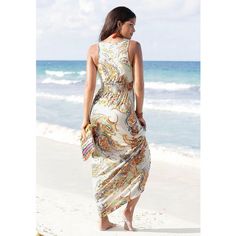 This beautiful maxi dress is perfect for your next vacation. * Decorative springs on the straps * Smocked waistline * Print may vary * Length approx. 54.25 inches * 100% Viscose. LIPR: Sustainable Viscose. Imported. * Machine wash cold with like colors, inside out * Hang to dry or lay flat Casual Halter Neck Maxi Dress For Summer Outings, Summer Maxi Dress For Vacation, Multicolor Long Sundress For Beach, Sleeveless Summer Maxi Dress For Summer Outings, Summer Vacation Maxi Dress, Sleeveless Maxi Dress For Summer Outings, Long Sundress For Beach Season Vacation, Long Sundress For Beach Vacation, Beachy Maxi Dress For Day Out