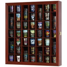 a wooden shelf filled with lots of different types of glasses