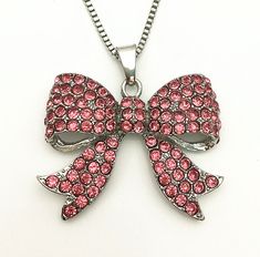 Condition: New Metal: Alloy Size: 4.3*3.5cm Chain Length: 70cm Fashion Pink Crystal Rhinestone Bowknot Pendant Sweater Necklace Condition: New    Metal: Alloy   Size: 4.3*3.5cm    Chain Length: 70cm PaymentDelivery detailsTerms of salesAbout usContact us Payment We only accept the paypal. When you send your payment to me , please confirm your address is accordant with the address given on paypal. Don't pay them one by one. Combine shipping to make the package more faster and safety. Delivery details · FREE SHIPPING Worldwide from China · We will arrange shipping for you in 1-2 business days after you pay. · We will check items before sending(pack in plain bubble envelop) · Items usually takes 15-30 days to arrive North America, Western Europe and Australia by air mail(other places may need Hello Kitty Gifts, Bow Pendant, Sweater Necklace, Ad Fashion, Sparkly Jewelry, Sewing Design, Funky Jewelry, Western Europe, New Metal