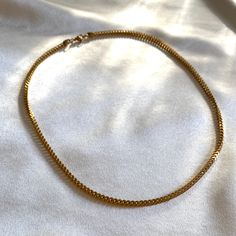 A classic chain with an edge — a square edge to be exact. Worn on its own or layered with others, this is the unique style your dainty collection is longing for. As this necklace is 18K gold plated stainless steel, it has to be looked after for you to enjoy it for a longer period of time. Here are a few tips to help care for your necklace;• Keep away from waterAvoid showering, saunas / steam rooms, swimming, sleeping and exercising in this necklace.• StorageKeep this necklace stored in the origi Classic Jewelry With Adjustable Chain And Square Pendant, Everyday Jewelry With Curb Chain Links, Square Chain Jewelry As A Gift, Square Chain Jewelry Gift, Classic Rectangular Jewelry For Everyday, Classic Rectangular Everyday Jewelry, Everyday Jewelry With Delicate Square Pendant Chain, Everyday Necklace With Adjustable Chain And Square Pendant, Everyday Jewelry With Square Pendant Chain