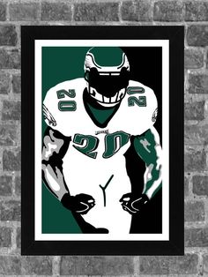 a green and white football player on a brick wall