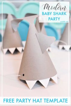 paper shark party hats with text overlay that reads free party hat template modern baby shark party