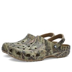 Find CROCS Classic Printed Camo Clog on Editorialist. First debuted in 2002, Crocs’ Classic clog has grown to be a global phenomenon, worn and loved by celebrities, fashionistas, and dads alike. Slip into this season's adventurous new camo patterned pair and feel the comfort of the iconic croslite™ footbed underfoot. The water-friendly design is finished with the signature ventilation ports at the front, so grab your Jibbitz charms and personalise away! Foam Construction, Croslite™ Footbed, Heel Real Tree Crocs, Spring Outdoor Clogs With Rubber Sole, Spring Outdoor Closed Toe Clogs, Spring Slip-on Clogs For Outdoor Activities, Spring Outdoor Slip-on Clogs, Casual Closed Toe Clogs For Outdoor, Casual Closed Toe Outdoor Clogs, Casual Brown Clogs For Outdoor Activities, Crocs Camo