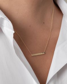 "14K solid gold Bar necklace with a tiny diamond , comes in the gold color of your choice, and length of your choice, dainty and absolutely amazing! The perfect everyday necklace, by itself or layered. made in L.A. Size: Approx. 1\" Diamond: 0.01 ct wt Ships in 5 to 7 business days Comes gift ready in our beautiful branded jewelry box." Elegant 14k Gold Hand Stamped Necklaces, Elegant 14k Gold Necklace With Hand Stamped Details, Elegant 14k Gold Necklace Hand Stamped, Elegant Gold Hand Stamped Name Necklace, Minimalist Nameplate Necklace, Minimalist Gold Engraved Name Necklace, Elegant Hand Stamped Nameplate Necklace, Minimalist Engraved Gold Name Necklace, Minimalist Yellow Gold Bar Necklace For Anniversary