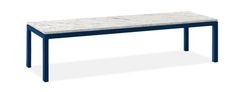 a white marble top and blue metal frame coffee table with an open shelf underneath it