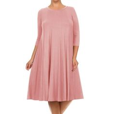 Product Description: Plus size dress features 3/4 sleeves, which are a versatile length that provides some coverage without being too warm. This makes the dress ideal for year-round wear, as it can be paired with sandals or sneakers in warmer weather or with tights and boots in cooler weather. One of the standout features of the dress is its pleated detailing. The pleats start at the waist and continue down the skirt of the dress, creating a subtle yet eye-catching effect. The pleats give the dr Solid Midi Dress, Moa Collection, Tights And Boots, Plus Size Activewear, Cooler Weather, Plus Size Casual, Plus Size Dress, Swing Dress, Dress Making