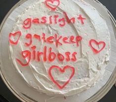 a white cake with red writing on it