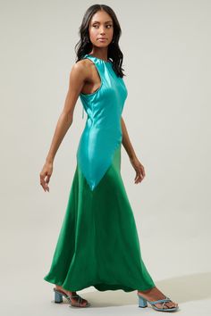 Step out and turn some heads in the Kavela sheath maxi. Features a halter inspired neckline with an adjustable strap. It maintains a sleek, sheath fit. Slightly widends towards the hem. Pair it with strappy heels and your go-to accessories.- Heavyweight Satin- Drawstring- Keyhole- Sheath- Comes in 3 colorsSize + Fit - Model is 5'10" and wearing size XS- Measurements taken from size S - Chest: 16 3/4"- Length: 55" Fabric Self:96% Polyester 4%Spandex Lining:95% Polyester 5%Spandex Style Number STD Green Maxi Length Halter Dress For Evening, Fitted Green Maxi Dress With Bias Cut, Green Bias Cut Maxi Dress For Party, Green Satin Stretch Midi Dress, Green Maxi Length Halter Dress For Party, Green Maxi Halter Dress For Evening, Green Floor-length Halter Dress For Party, Spring Halter Neck Maxi Dress With Bias Cut, Green Halter Maxi Dress For Evening