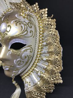 Venetian Mask for decoration - Traditional and original papier-mache Venetian mask, handmade and decorated with metal insert, gold-leaf and glitters,enriched with Swarovski crystals. Dimension: Not wereable,only for decoration :Hight 31cm,width 24cm All our masks are handmade papier-machè masks made in Venice. Our decorators use techniques typical of the Venetian tradition such as stucco, acrylics, gold and silver-leaf, macramè, passementerie, glitters and crequelè to offer you a wide range of o Gold Full-face Masks And Prosthetics For Carnival, Gold Full Face Masks For Carnival, Gold Full Face Masks And Prosthetics For Carnival, Gold Baroque Masquerade Mask For Carnival, Gold Masks And Prosthetics For Carnival Costume, Gold Venetian Masks For Festivals, Gold Baroque Masks For Mardi Gras, Gold Masks And Prosthetics For Carnival, Gold Full Face Masquerade Mask For Carnival