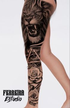 a woman's leg with tattoos on it and an animal tattoo design in the center