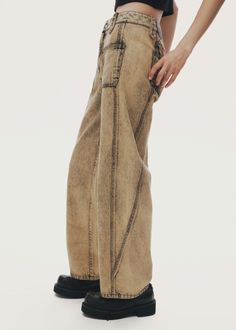 These jeans feature a wide, straight-leg and a panelled construction with a unique dirty gold wash and fading throughout. The pair have wide belt loops, a zip and button fly, a brand patch, and patch pockets at both sides, uniqely intersecting with the seams. 100% cotton. Model is 5ft 7 and wears size S. Brown Utility Jeans With Patch Pockets, Distressed Utility Mid-rise Bottoms, Brown Streetwear Bottoms With Patch Pockets, Brown Patchwork Jeans, Patched Detail Flap Pocket Wide Leg Jeans, Patch Pocket Jeans, Floral Camo, Officine Creative, Gold Wash