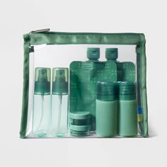 Carry your favorite cosmetics and toiletries without any hassle on flights with the help of this Deluxe Travel Bottle Set from Open Story™. This travel bottle set includes eight TSA-approved small containers to store liquids and gels like your moisturizer, sunscreen, shampoo, conditioner, face wash and more. The set includes one lotion bottle, one bottle with sprayer, two silicone bottles, two rolling bottles and two jars. Compact in size, the set comes in a transparent zipper pouch for easy pac Dark Ivy, International Travel Essentials, Silicone Travel Bottles, Travel Bottle Set, Travel Size Toiletries, Travel Finds, Silicone Bottle, Lotion Bottle, Travel Bottles