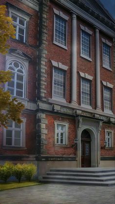 an old red brick building with steps leading to it