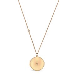 14k gold large round locket necklace with a star set diamond in the middle and floating diamond set into the chain SPECIFICS • 14k thick cable chain adjustable at 26-27-28"• locket is approx. 25mm• white diamonds .13 ctw Rose Gold Round Locket Necklace, Oval Diamond Locket Necklace, Elegant Rose Gold Round Locket Necklace, Diamond Locket Necklace With Round Pendant, Elegant Round Locket Necklace With Polished Finish, Fine Jewelry Rose Gold Necklace With Locket, Fine Jewelry White Gold Locket Necklace, White Gold Star Charm Round Pendant, Fine Jewelry Rose Gold Locket Necklace