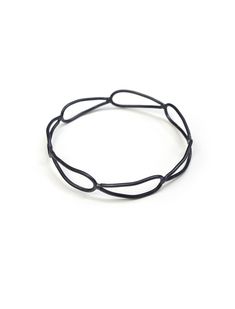 Wear this skinny bangle bracelet on it's own for an impactful minimal look, or stack multiples for the perfect arm party. Handcrafted in black steel. Bracelet is approximately 1/2" wide. Also available in bronze and silver. Bracelet sizing: Small – approximately 2 3/8” inner diameter Medium – approximately 2 1/2" inner diameter Large – approximately 2 7/8” inner diameter Handmade to order. Please allow 1-2 days for your bracelet to ship. Minimal Look, Arm Party, Stacked Bangles, Steel Jewelry, Black Steel, Steel Bracelet, Bangle Bracelet, Monument, Bangle Bracelets