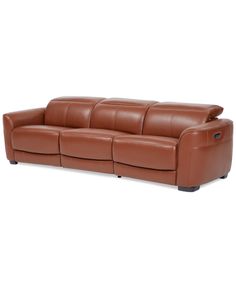 a brown leather couch sitting on top of a white floor next to a red frame