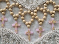 Price is for 12 mini rosaries. Each comes in their own favor bag Handmade mini rosaries available in pink, blue, and white. Cross is made out of epoxy resin Choose between gold or silver flakes Dark and Light wood beads available Perfect for your baptism or communion party favors Custom orders available, just message me and I will gladly work with you Handmade Pink Spiritual Rosary, Handmade Pink Rosary With Round Beads, Handmade Pink Rosary For First Communion, Handmade Pink Rosary With Cross Shape, Handmade Pink Rosary In Cross Shape, Handmade Pink Rosary For Baptism, Handmade Pink Rosary With Cross, Handmade Pink Cross Rosary, Finger Rosary