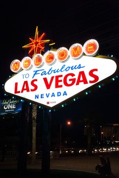 the welcome to fabulous las vegas sign lit up at night