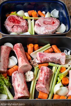 two metal pans filled with meat and vegetables