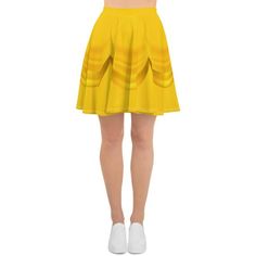 This gorgeous skater skirt features an illustration of draped yellow fabric inspired by Belle's ball gown in Beauty and The Beast. This light and stretchy skirt is perfect for a princess running costume for racing to the castle.The soft fabric and flared cut of this skater skirt are just a few of the reasons why it's bound to become a favorite in your wardrobe. The flattering silhouette looks great on any body type, and thanks to the elastic waistband, you'll feel extra comfy.• 82% polyester, 18 Yellow A-line Pleated Skirt, Yellow Pleated Stretch Skirt, Yellow Stretch Pleated Skirt, Yellow A-line Lined Skirt, Fitted Yellow Lined Pleated Skirt, Fitted Yellow Pleated Lined Skirt, Yellow Fitted Pleated Tennis Skirt, Yellow Fitted Tennis Skirt For Summer, Fitted Yellow Pleated Tennis Skirt