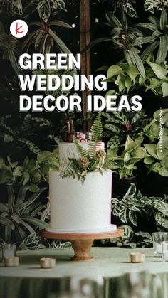 a wedding cake sitting on top of a table with greenery behind it and the words green wedding decor ideas