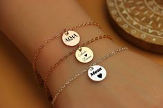 ✅ A bracelet that speaks volumes without saying a word. Our personalized engraving bracelet lets you immortalize what matters most. ✅ Available in silver, rose gold and yellow gold ✅ Customize with a name, date, coordinates, or special message ✅ Bracelet length options from 3.5-9 inches  ✅ Metal: Gold plated over brass 🎁 This coin style bracelet is more than just a piece of jewelry - it's a wearable symbol that celebrates your most cherished people, places, and moments. Engrave it with a name that fills your heart or coordinates of a special location. Slip it on each day as a constant reminder of what (or who) inspires you. This bracelet is a thoughtful gift that will be treasured for years to come. ✨Whether you're shopping for yourself or a loved one, this personalized bracelet is the pe Mother's Day Inspirational Personalized Name Bracelet, Personalized Round Bracelet As A Gift, Personalized Round Bracelets For Gifts, Engraved Round Charm Bracelet As Gift, Meaningful Name Bracelet For Mother's Day Gift, Hypoallergenic Inspirational Name Bracelet As Gift, Personalized Round Charm Bracelet Gift, Meaningful Name Bracelet For Friendship On Mother's Day, Mother's Day Gift Stainless Steel Name Bracelet