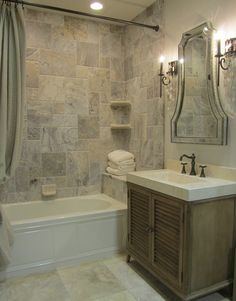 a bathroom with a sink, mirror and bathtub