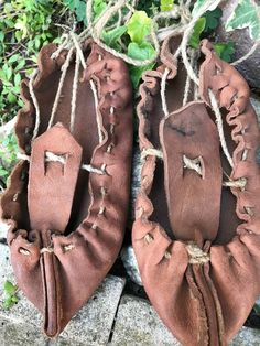 "Vintage folk leather sandals -antique handmade Bulgarian folk shoe -primitive handmade shoes -traditional shoes -primitive rural shoes This is primitive shoes from the beginning of the last century and handmade from calfskin. The leather is very thick and solid. There are abrasions and fading in the skin, but are in very good condition. These traditional Bulgarian shoes are called \"tsarvuli\". They are wonderful for decoration of a farmhouse. MEASUREMENTS: Length: 18.5 cm (7.28 in) I send each Traditional Natural Color Round Toe Sandals, Traditional Handmade Barefoot Sandals With Round Toe, Festival Moccasins With Soft Sole And Round Toe, Leather Barefoot Sandals With Round Toe, Soft Sole Round Toe Moccasins For Festival, Handmade Bohemian Closed Toe Moccasins, Bohemian Handmade Round Toe Moccasins, Handmade Bohemian Moccasins With Round Toe, Handmade Traditional Closed Toe Clogs