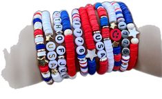 a stack of bracelets with the word usa written on them and red, white, and blue beads