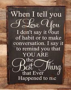 a wooden sign that says, when i tell you love you don't say it out