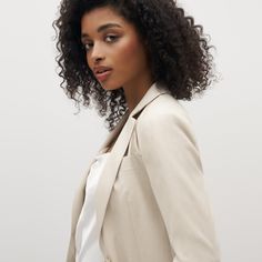 Keep it cool in the women’s tan suit. Meticulously tailored with comfortable drape, our luxurious light beige suit plays up a classic look. Perennially on-trend, this delicate camel pantsuit is constructed with Eco Stretch fabric for a breezy feel and a look that moves with you. Cream Blazer With Double Button And Notch Lapel, Formal Beige Blazer With Double Button Closure, Structured Beige Blazer For Business, Beige Single Button Suit For Office, Beige Single Button Office Suit, Elegant Structured Beige Blazer, Timeless Semi-formal Blazer For Spring, Chic Spring Business Suits, Semi-formal Timeless Spring Blazer