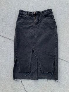 Black jean skirt with an edgy hemline, women's size S (26) Edgy Dark Wash High Waist Skirt, Edgy High Waist Dark Wash Skirt, Edgy Dark Wash Mini Skirt, Edgy Cutoff Denim Skirt With Frayed Hem, Edgy Cutoff Denim Skirt, Edgy Dark Wash Cutoff Denim Skirt, Edgy Cutoff Dark Wash Denim Skirt, Edgy Dark Wash Denim Skirt, Edgy High Rise Denim Skirt With Frayed Hem