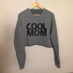 Cool mom top. This modest cropped sweatshirt is womens sizing with extra long sleeves for style and comfort. Shop our collection of womens t-shirts, sweatshirts, and hats. Made using high quality, soft, comfortable materials Extra Long Sleeves, Cropped Sweatshirt, Comfy Sweaters