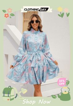 Justine Printed High Neck Ruffle Mini Dress - Blue Blue Ruffled Midi Dress For Spring, Blue Ruffled Midi Dress For Brunch, Chic Light Blue Dress For Fall, Blue Ruffle Hem Dress For Brunch, Light Blue Ruffled Midi Dress For Garden Party, Blue Ruffled Dress For Day Out, Blue Mini Dress With Ruffle Hem For Spring, Blue Ruffled Dress For Spring, Spring Blue Ruffled Dress