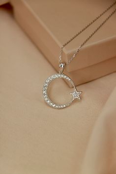 Silver Star and Crescent Necklace   ✔Handmade silver moon&star necklace and earrings ✔925 sterling silver ✔Preserves its shine for a long time ✔Ready for shipping Necklace  Material: 925 Sterling Silver Gemstone: Zircon Stone Width: 2.30 cm-0.90 in.100111 Height: 2 cm-0.78 in. Weight: 3.57 gr Earrings Material: 925 Sterling Silver Gemstone: Zircon Stone Width: 1 cm-0.39 in. Height: 0.80 cm-0.31 in. Weight: 1 gr You may choose it as a gift.🤍 If you have a question please don't hesitate to contact me.  YOU MAY USE THE EXPRESS SHIPPING OPTION TO GET YOUR ORDER FASTER. Express shipping send by UPS, TNT, and FedEx. Delivery time:  *Europe 2-4 business days, *USA- Canada 3-7 business days, *Everywhere else 5-10 business days. **Please share your phone number with me in case of cargo returns. Fe Moon Pendant Necklace Silver, Silver Crescent Necklace Fine Jewelry, Silver Crescent Necklace In Fine Jewelry Style, Silver Crescent Fine Jewelry Necklace, Elegant Silver Jewelry With Star Charm, Silver Crescent Fine Jewelry, Silver Round Pendant With Star Charm, Silver Round Pendant With Star Charm Jewelry, Silver Jewelry With Star Charm On Round Pendant