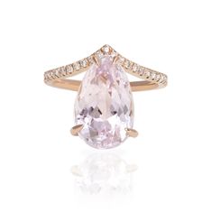 Captivating with femininity, Kunzite is gemstone of love and joy. Pink Water ring is a sensual drip of elegance to activate the soft and delicate blush tones of this natural gem. Crafted in rose gold and accented with diamonds. 18k rose gold Kunzite, 6.2ct Diamonds, 0.35ct In Stock, size 6 Luxury Rose Gold Elegant Crystal Ring, Water Ring, Pink Engagement, Pink Engagement Ring, Water Rings, Pink Water, Blush Tones, Pink Princess, 18k Rose Gold