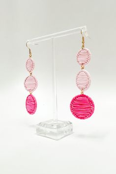 Details: Everyone's hearts will go round and round when they catch a glimpse of these Aislynn Circle Raffia Drop Earrings! With a beautiful circle shape and soft raffia detailing, these earrings will bring subtle femininity and style to any ensemble! - Metal- Raffia- Fish hookContent: 3.5" LBrand: Golden StellaFinal sale item Pink Dangle Hoop Earrings For Summer, Summer Pink Dangle Hoop Earrings, Pink Hoop Earrings For Spring Beach Occasions, Pink Hoop Earrings For Beach And Spring Season, Pink Hoop Earrings For Beach During Spring, Pink Dangle Earrings For Beach, Pink Round Jewelry For Spring, Pink Earrings For Beach, Pink Dangle Hoop Earrings For Valentine's Day