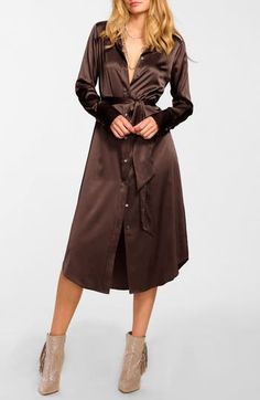 This irresistible day-to-night shirtdress is crafted in a luxe satin blend and designed with a defining tie belt. Front button closure Spread collar Long sleeves Removable tie belt 92% silk, 8% spandex Dry clean Imported Button Down Midi Dress, Ramy Brook, Shirtdress, Tie Belt, Uganda, Jumpsuit Romper, Button Downs, Online Store, Midi Dress