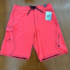 Billabong Recycler Men’s 31 Recycler All Day Px3 Board Shorts Red Swim Trunks Spandex Very Stretchy New Platinum Stretch Athletes Choice Recycled Material Perfect For Lifeguards Solid Neo Red Pocket With Stretch Rope Hook To Attach Valuables To Velcro Closure Pink Bottoms With Built-in Shorts For Outdoor, Red Surfing Shorts, Casual Fitted Red Swim Trunks, Red Fitted Casual Swim Trunks, Fitted Red Casual Swim Trunks, Red Short Bottoms For Surfing, Fitted Red Swim Trunks For Sports, Pink Outdoor Bottoms With Built-in Shorts, Casual Red Swimwear For Surfing