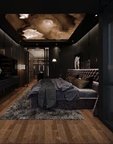 a bedroom with wooden floors and black walls