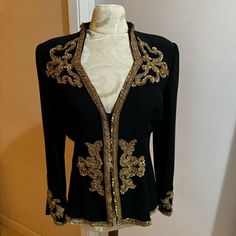 This Jacket Is Exquisite! Every Bead Meticulously Placed Masterfully Tailored! Sooo Gorgeous! Gold Sequins, Seed Beads & Round & Oval Gold Toned Beads. Small Shoulder Pads, Fully Lined. Has A Gold Bib That Can Be Removed From Snaps. Hidden Snap Closure. Excellent Condition. *Please See All Photos As Part Of Description.* Smoke Free Home. Designer Jacket, Gold Sequins, Jacket Design, Shoulder Pads, Snap Closure, Vintage Black, Seed Beads, Jackets & Coats, Product Description