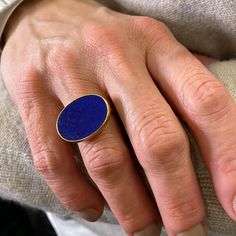 An ancient color combination in blue and gold, this Gabriella Kiss ring features an east-west bezel set oval lapis slab, with a buttery smooth surface to the deep blue stone. Lapis measures 3/4” x 5/8”. Size 5.75. Handcrafted in Hudson Valley, NY, U.S. Engagement Rings Bezel, Contemporary Rings, Gabriella Kiss, Ring Blue Stone, Hudson Valley Ny, Lapis Jewelry, Bezel Engagement Ring, Lapis Ring, Art Jewelry Contemporary