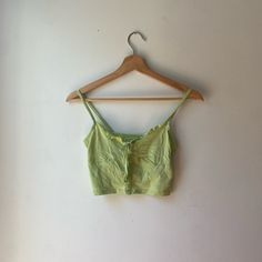 Ruffle Bow Cami Pastel Green New Without Tags- Perfect Condition Spring Day Out Crop Top With Tie Straps, Green Tops With Tie Straps For Day Out, Spring Crop Top With Tie Straps For Day Out, Spring Vacation Crop Top With Tie Straps, Green Tank Top For Spring, Green Tank Top For Spring Day Out, Fitted Green Crop Top With Ruffles, Green Cropped Tank Top For Summer, Green Cropped Tank Top For Day Out