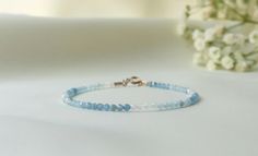 Ombre Aquamarine Bracelet 2mm Bead Bracelet March - Etsy Italy Delicate Blue Bracelets For Everyday, Delicate Adjustable Blue Beaded Bracelets, Dainty Blue Faceted Beaded Bracelets, Dainty Blue Beaded Round Bracelets, Dainty Blue Round Beaded Bracelets, Dainty Blue Beaded Bracelets, Blue Dainty Birthstone Bracelets, Blue Dainty Crystal Bracelet Gift, Dainty Blue Crystal Bracelet For Gift