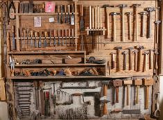 an old tool cabinet filled with lots of tools