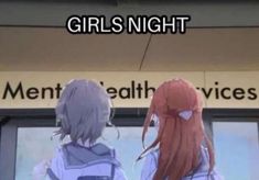 two girls standing in front of a building with the words girls night written on it