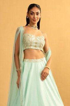 Ice blue blouse with gota work embroidery. Paired with lehenga and cape. - Aza Fashions Fitted Choli With Dori Work, Fitted Cutdana Choli, Fitted Tops With Dupatta For Reception, Fitted Tops With Dupatta For Navratri, Fitted Wedding Tops With Dupatta, Fitted Wedding Top With Dupatta, Gota Work, Work Blouse, Embroidered Blouse