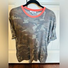 Nwt Camo T-Shirt With Orange Neck Super Soft Size Large Casual Camouflage T-shirt Relaxed Fit, Camouflage Graphic Print Relaxed Fit Tops, Camouflage Crew Neck Graphic Tee, Camouflage Graphic Print Relaxed Fit T-shirt, Camouflage Short Sleeve T-shirt With Relaxed Fit, Camouflage Relaxed Fit Short Sleeve T-shirt, Casual Camouflage Relaxed Fit T-shirt, Casual Camouflage Crew Neck Top, Camouflage Short Sleeve Top With Graphic Print